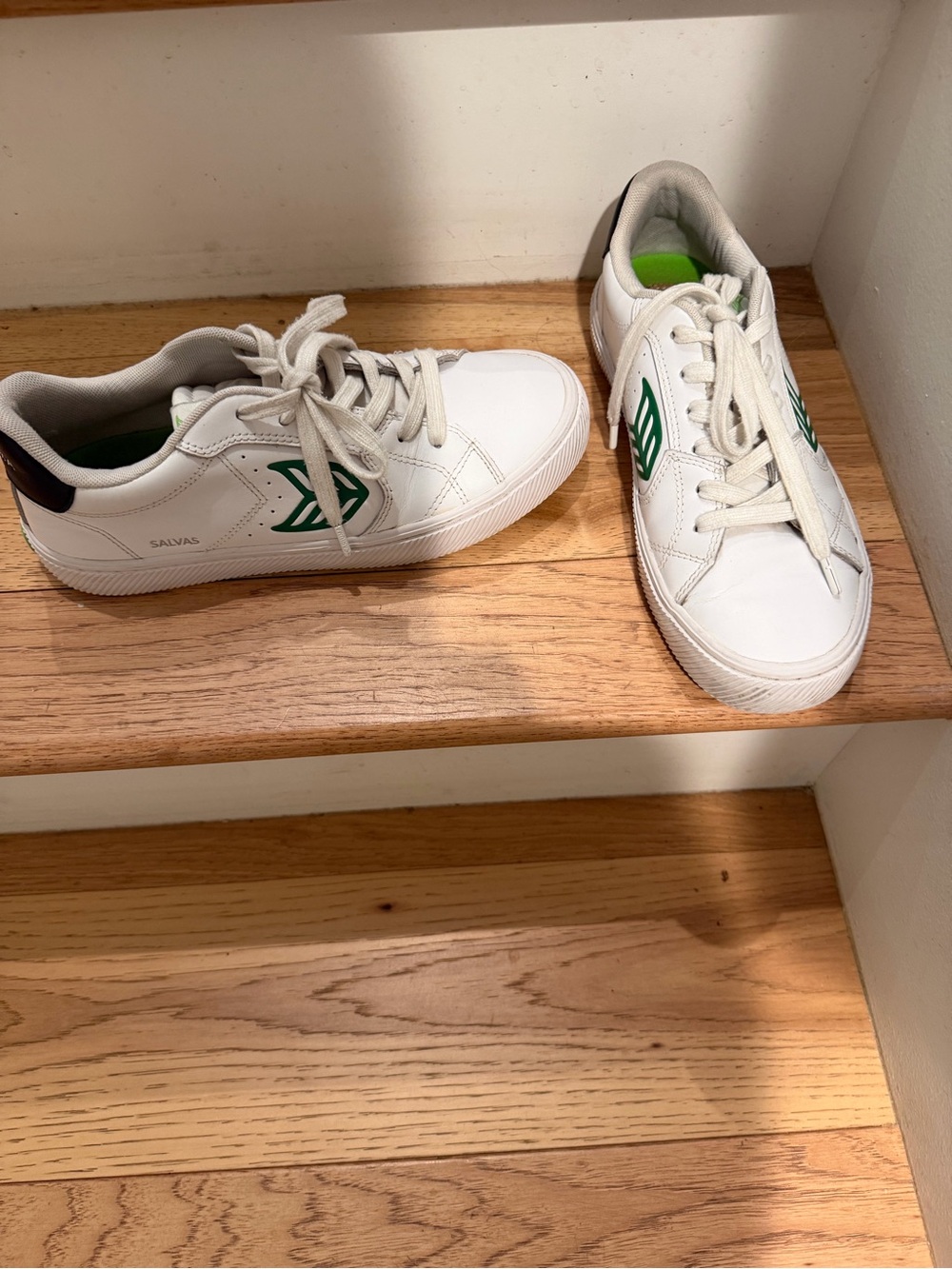 Cariuma White Sneakers with Green Stripe